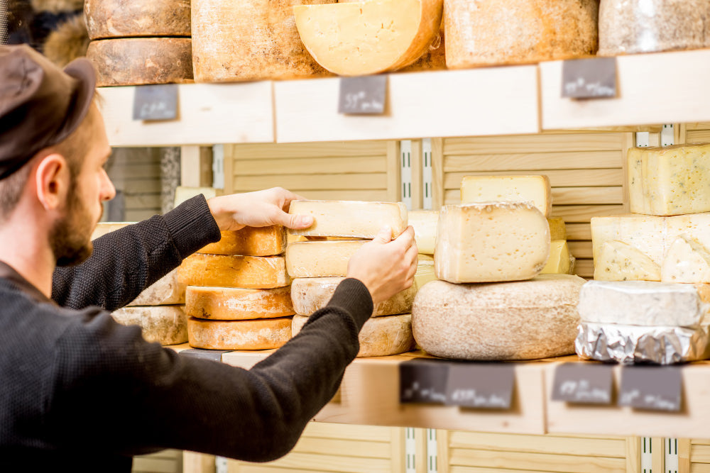 UK Cheese Hits Export Record as Dairy Sinks to 25%